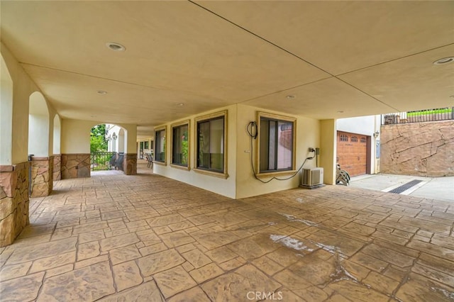 view of patio / terrace with a garage