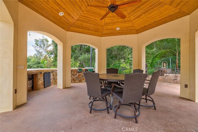 view of patio / terrace with ceiling fan and a gazebo