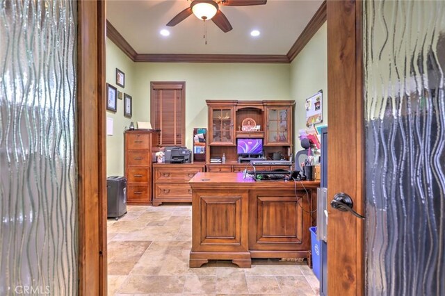 office area with stone finish floor, ceiling fan, and ornamental molding