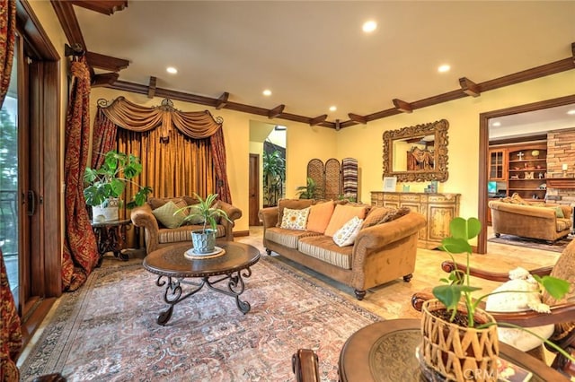 living room with ornamental molding and built in features