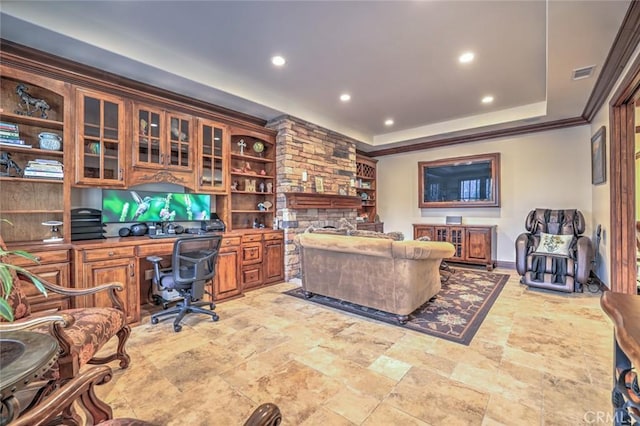 living area with crown molding, a raised ceiling, stone finish flooring, visible vents, and recessed lighting