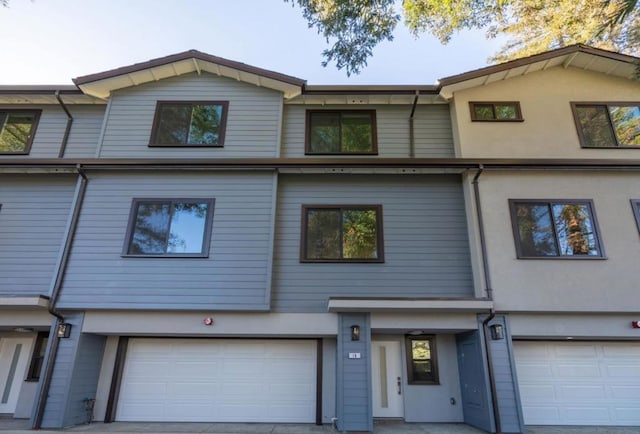 view of property featuring a garage