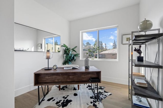 office space featuring light wood-type flooring