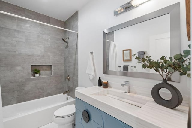 full bathroom with vanity, toilet, and shower / bath combo with shower curtain