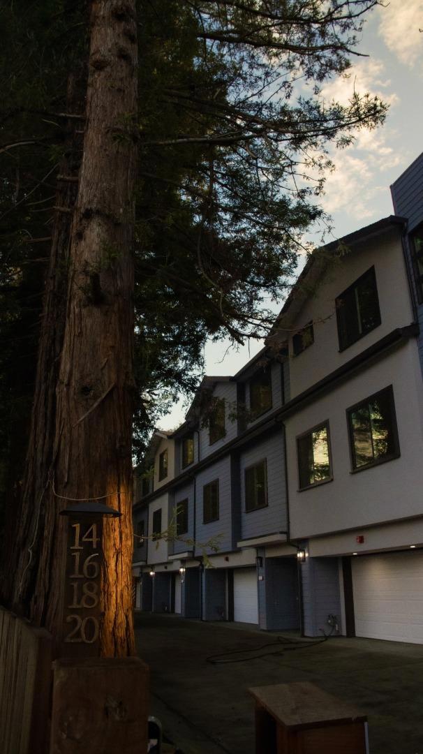 view of outdoor building at dusk