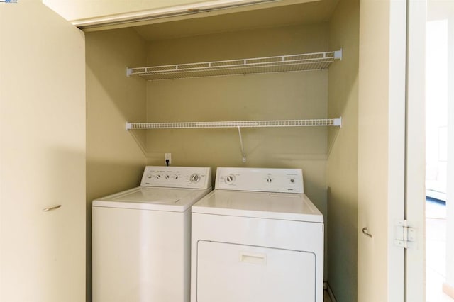 laundry area featuring separate washer and dryer