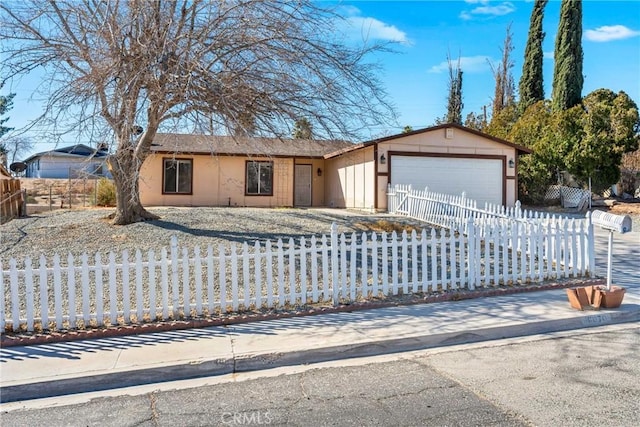 single story home with a garage