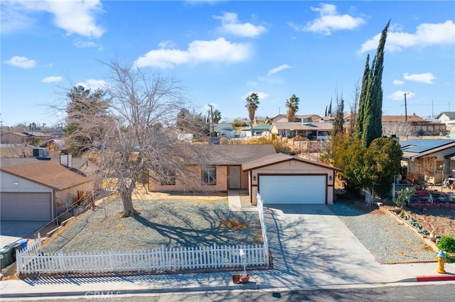 single story home with a garage