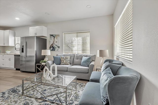 living room with light hardwood / wood-style flooring