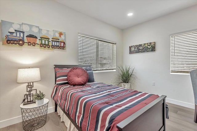 bedroom with wood-type flooring