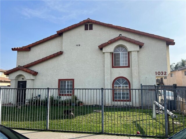 view of home's exterior with a lawn