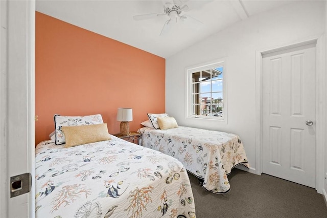 carpeted bedroom featuring ceiling fan and lofted ceiling