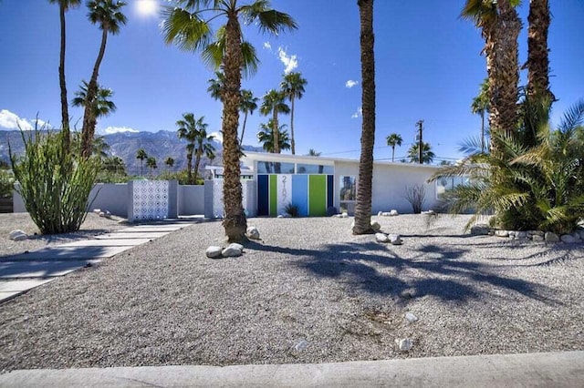 view of front of home featuring a mountain view