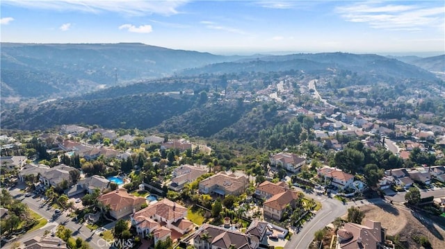 bird's eye view with a mountain view