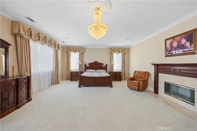 carpeted bedroom with multiple windows, ornamental molding, and a chandelier