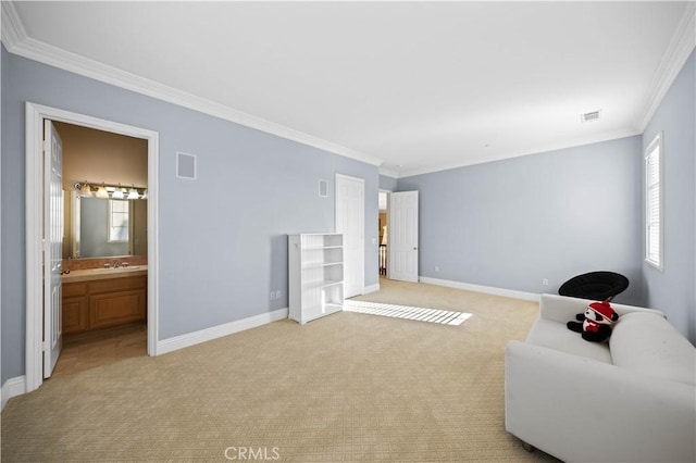 sitting room with light carpet, ornamental molding, and sink