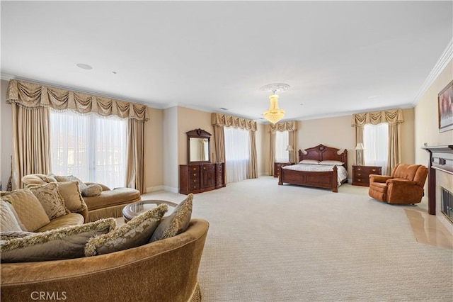 carpeted bedroom featuring ornamental molding and a fireplace