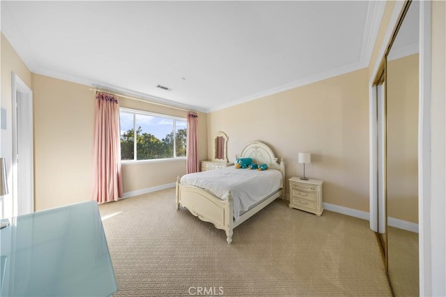 carpeted bedroom featuring ornamental molding