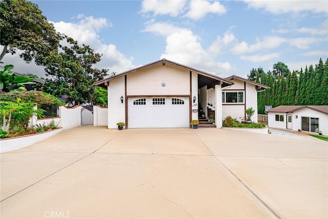 view of front of property featuring a garage