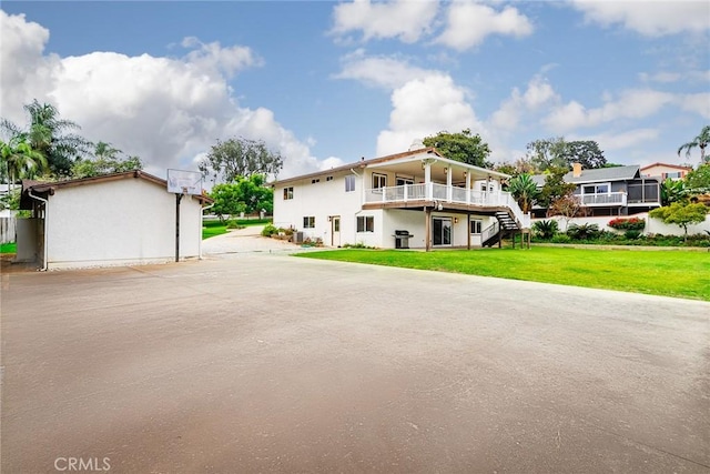 view of front of property with a front lawn