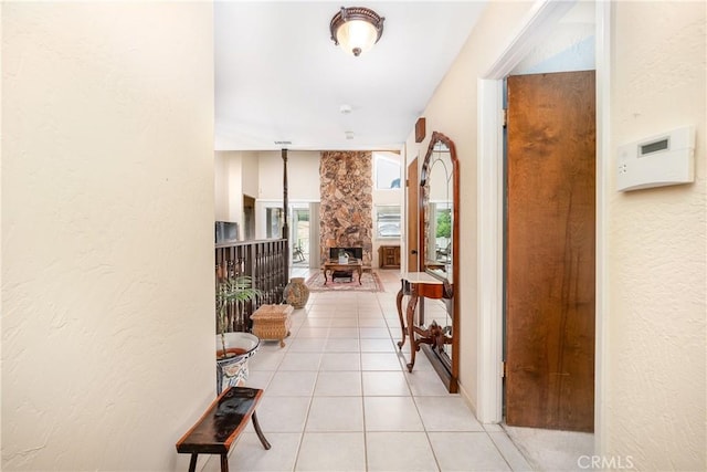 corridor featuring light tile patterned flooring