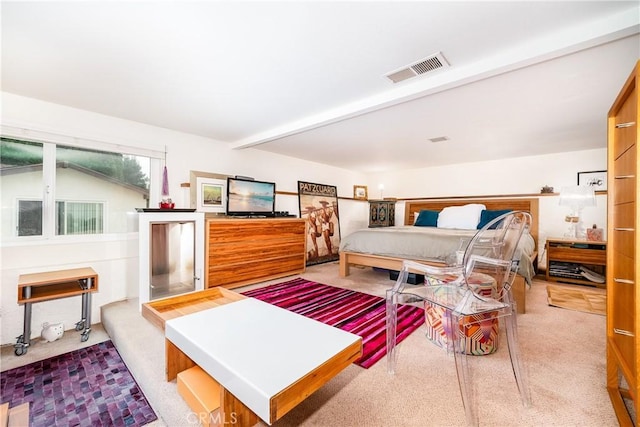 bedroom with beam ceiling