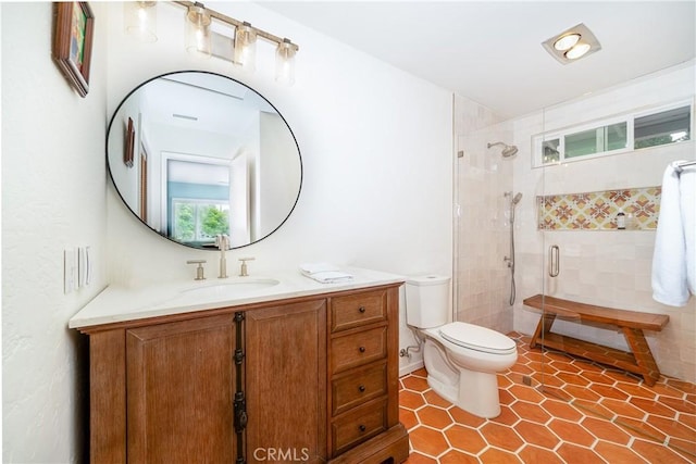 bathroom featuring toilet, walk in shower, and vanity