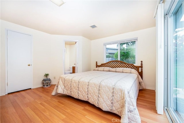 bedroom with light hardwood / wood-style floors