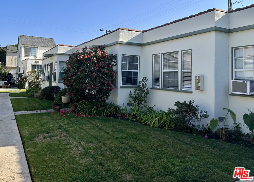 view of property exterior featuring a yard