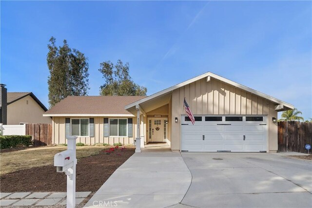 ranch-style home featuring a garage