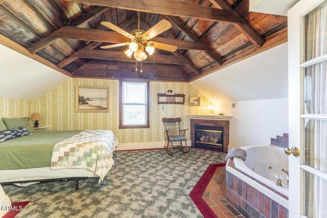 carpeted bedroom with wallpapered walls, a fireplace, wood ceiling, and vaulted ceiling with beams