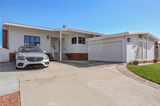 single story home with a garage