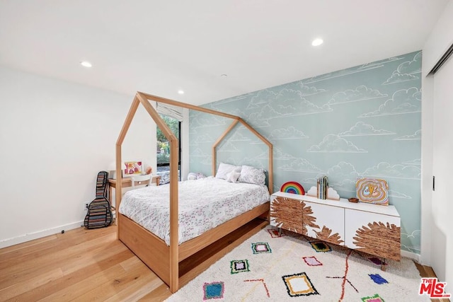 bedroom featuring hardwood / wood-style flooring