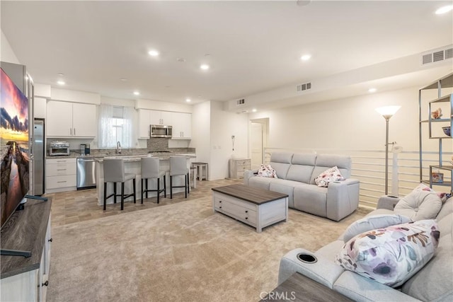 living room with sink