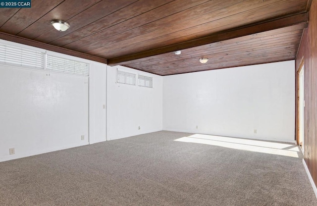 basement with carpet and wood ceiling