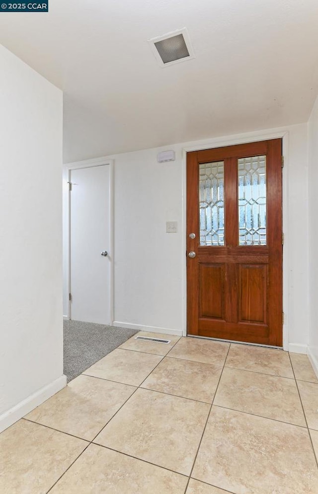 view of tiled entrance foyer