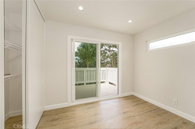 doorway to outside with light hardwood / wood-style floors