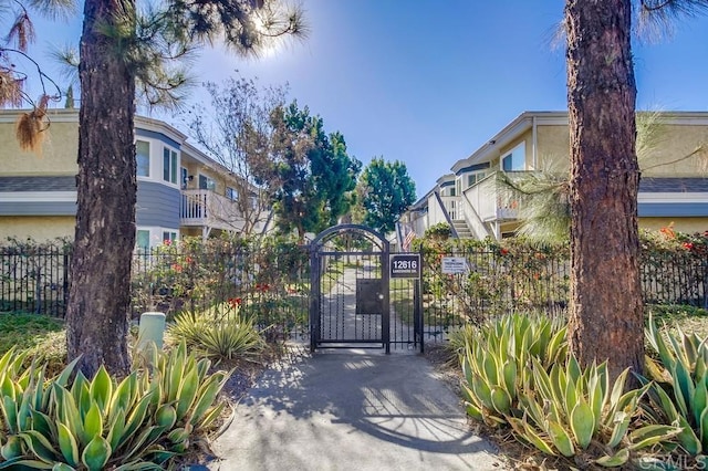 view of gate featuring fence