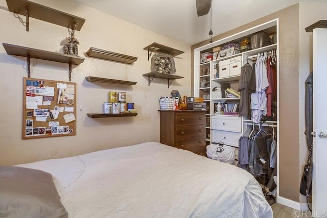 bedroom featuring wood finished floors