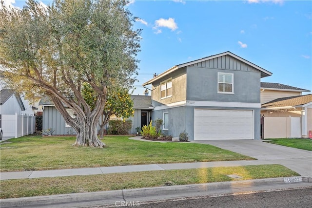 view of front of house featuring a front lawn and a garage