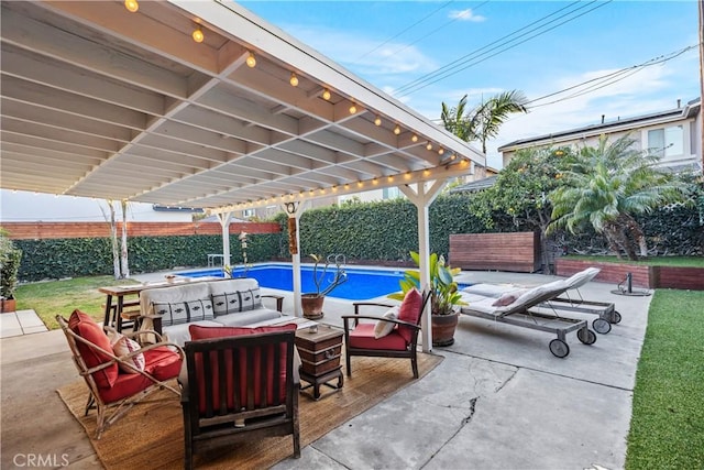 view of patio with an outdoor hangout area, a fenced in pool, and a pergola