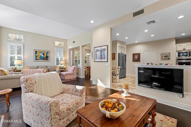 living room with dark wood-type flooring