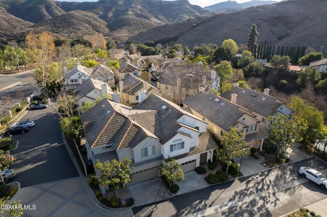 drone / aerial view featuring a mountain view