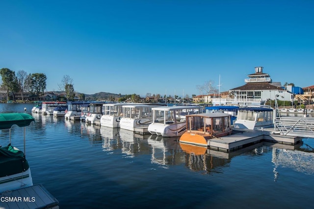 view of dock with a water view