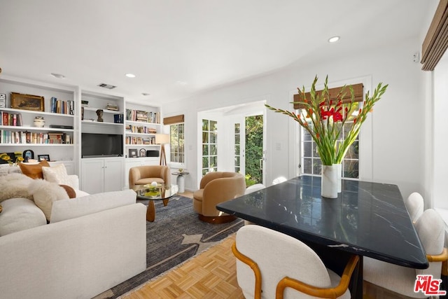 living room with parquet floors