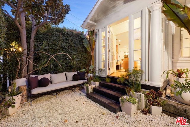 exterior space featuring an outdoor hangout area