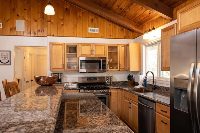 kitchen featuring appliances with stainless steel finishes, beamed ceiling, sink, hanging light fixtures, and wooden ceiling