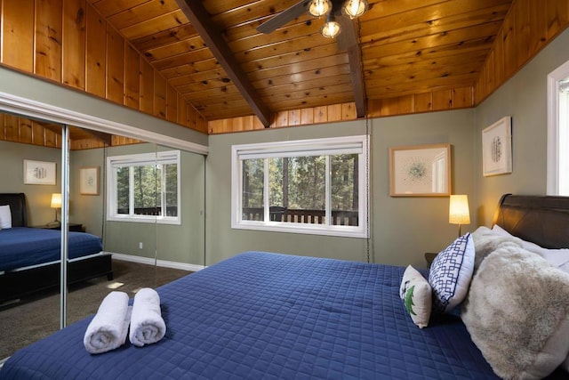 bedroom featuring wooden ceiling, a closet, and lofted ceiling with beams