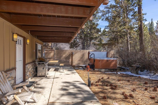 view of patio with a hot tub