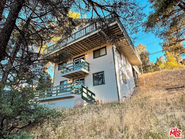 exterior space with a balcony